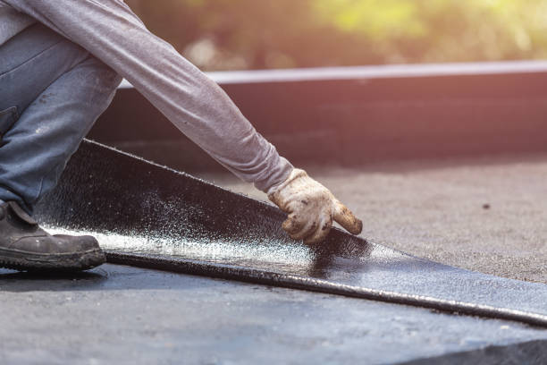 Professional Basement Waterproofing technician working in Pendleton, KY